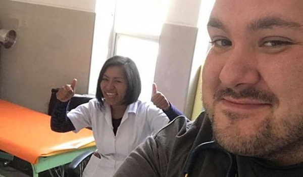 volunteer taking selfie with nurse