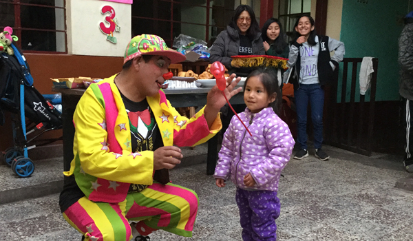 volunteer playing with kids
