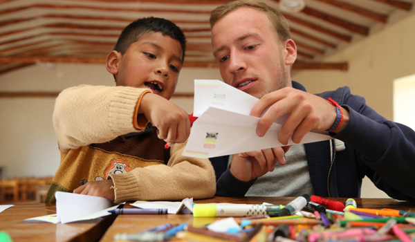 voluneer playing with kids