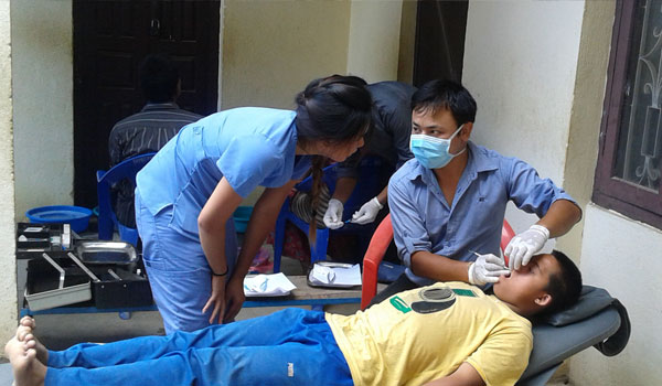volunteers checking patient
