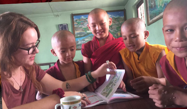 volunteer teaching monks