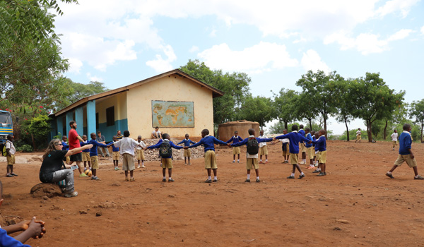volunteer teaching sport to kids in south africa