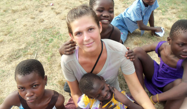 volunteer playing with orphan child